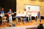 La cerimonia è stata accompagnata musicalmente dalla band della scuola "Cominais"